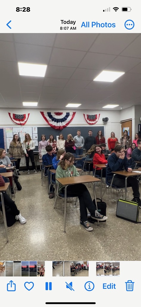 Rockridge Madrigal/Show Choir serenading in Mrs. Bizarri's 8th grade classroom